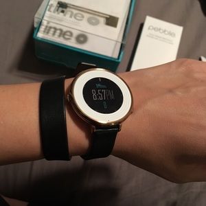 Rose gold “round” model pebble smart watch